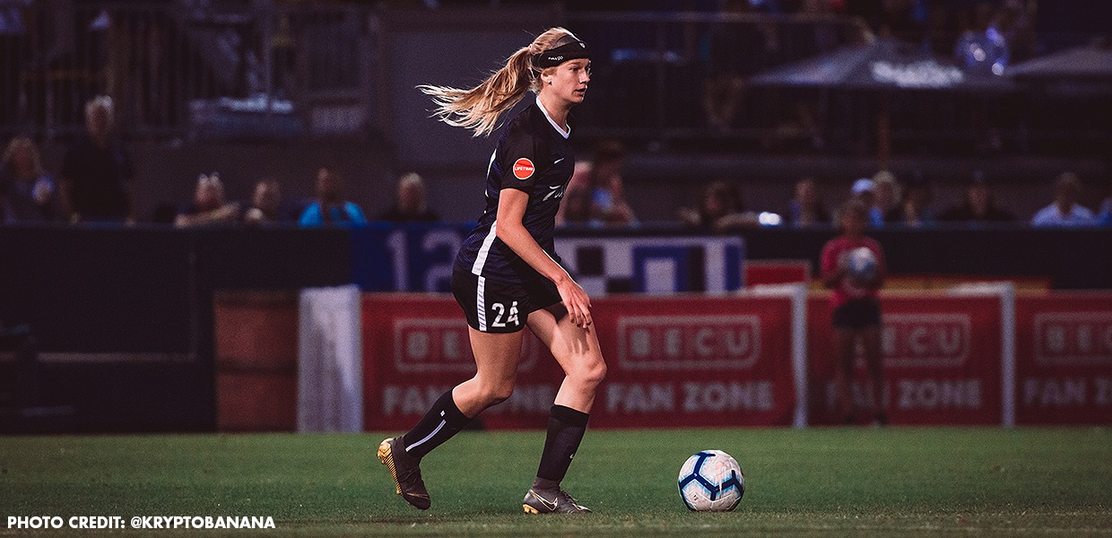 Alumna Bethany Balcer playing for Reign FC Soccer Program