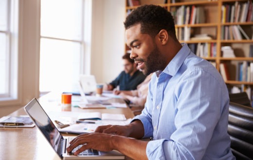 Adult Student Using a Laptop