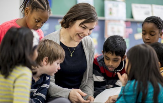 Teacher reading with students