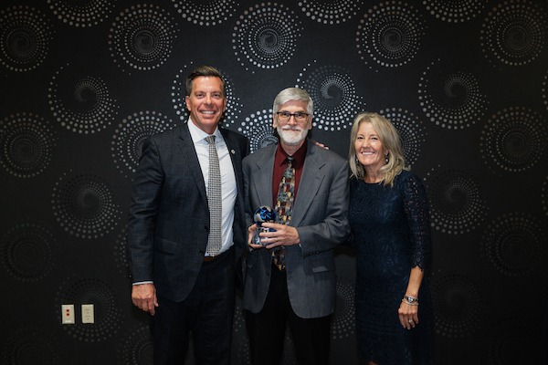 President Brent and Christi Ellis with 2022 Alumnus of the Year, Don Walker.