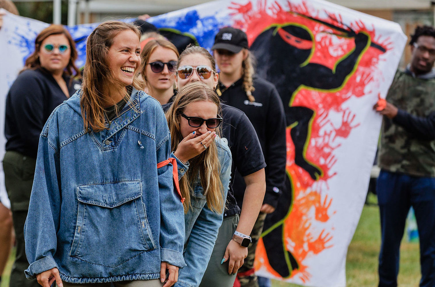 group of SAU students smiling and laughing at Arbor Games