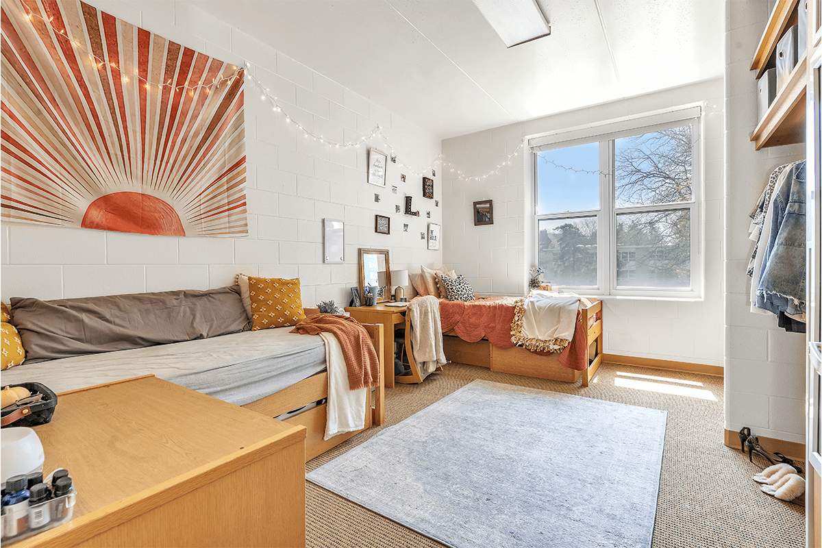 Beautifully decorated and bright dorm room.