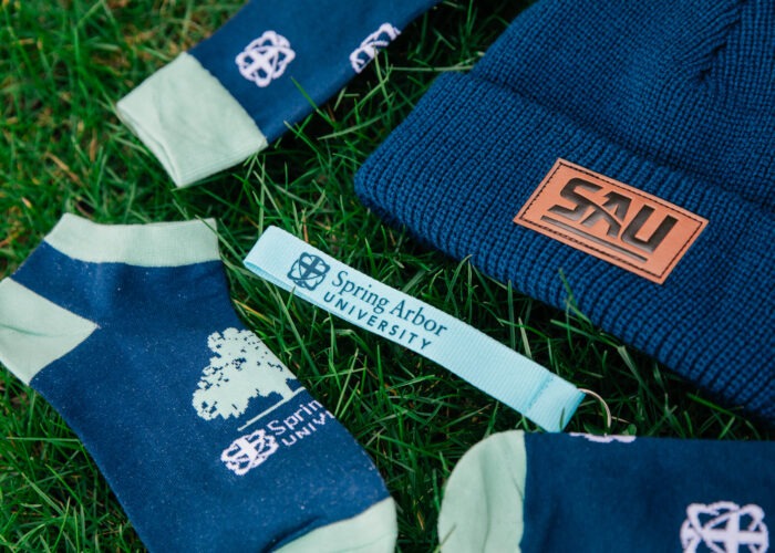Pairs of socks, beanie, key chain SAU give day branded