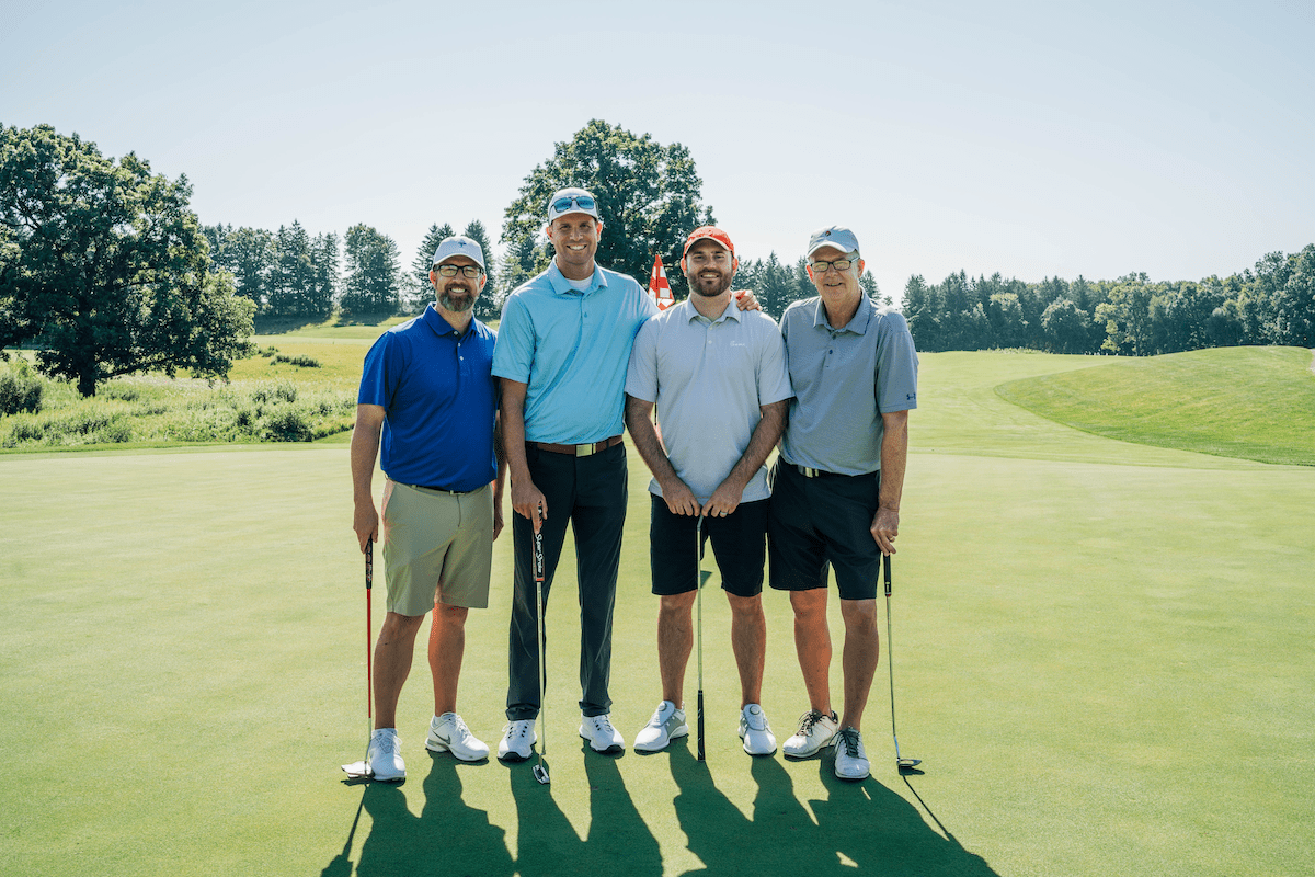 A golf team at the SAU Open Golf Scramble 2024.